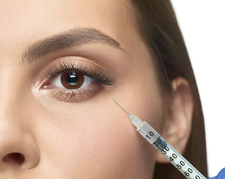 Volume being restored beneath the eye with an injection