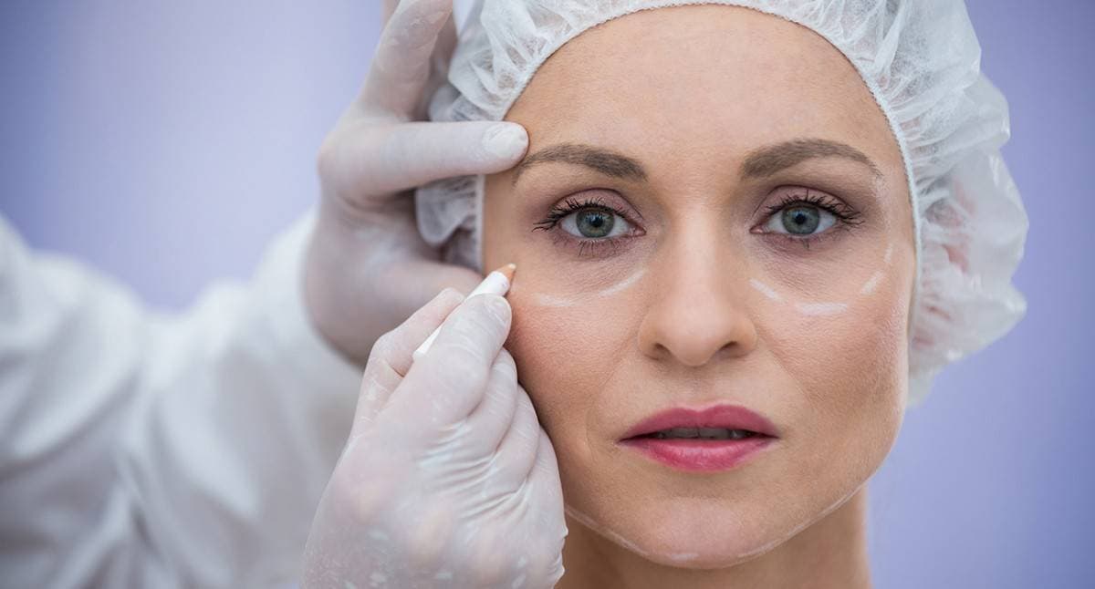 Doctor examining a patient's eye area